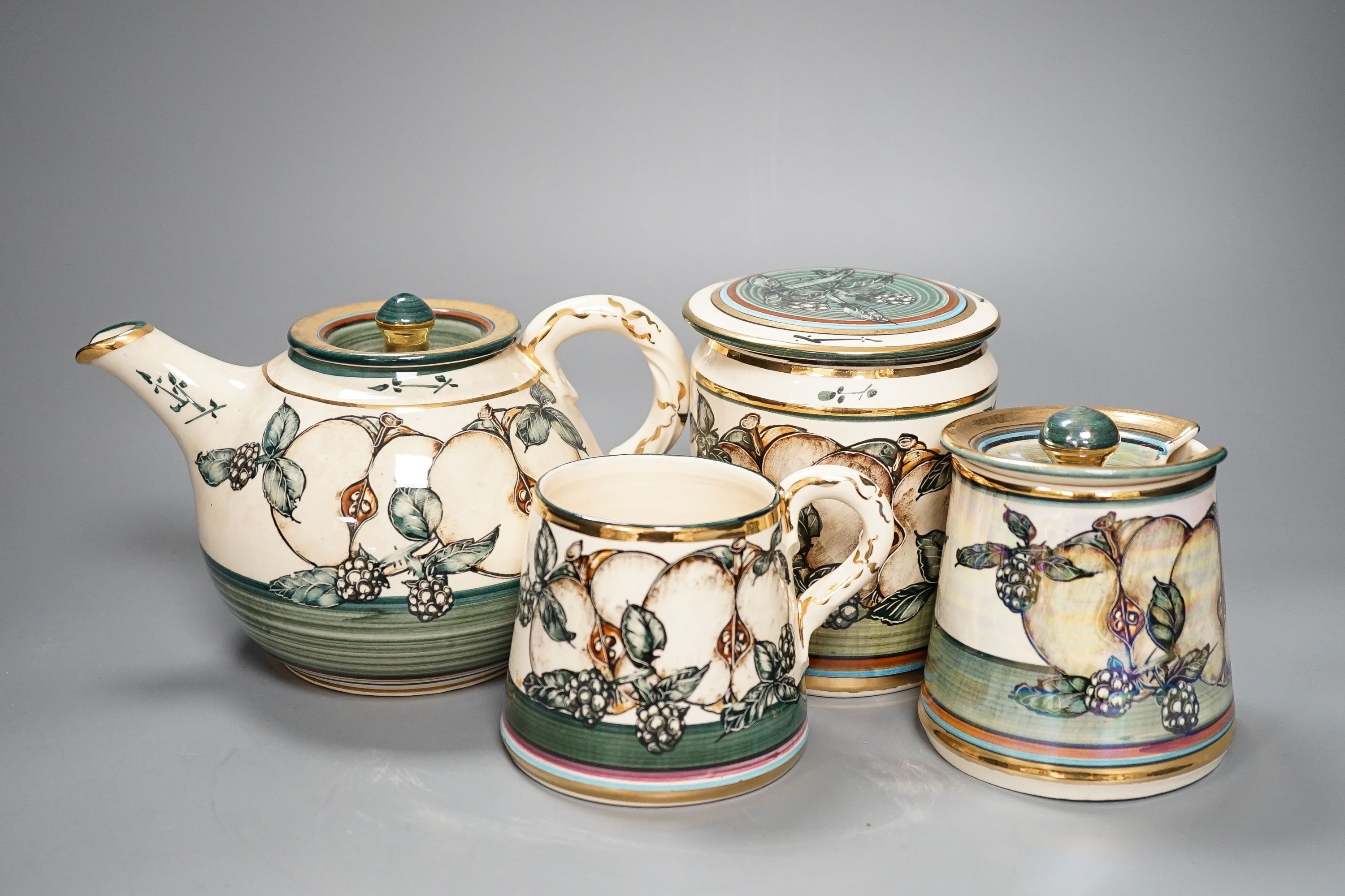 A collection of nine pieces of Lancastrian lustre ceramics, by Alvin Irving, tallest 17cm